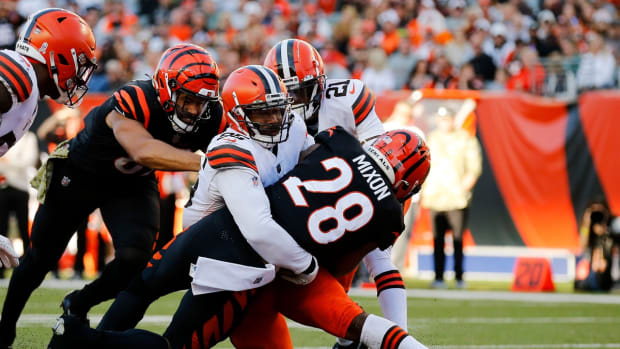 Cincinnati Bengals running back Joe Mixon (28) breaks through for a touchdown in the fourth quarter of the NFL Week 9 game between the Cincinnati Bengals and the Cleveland Browns at Paul Brown Stadium in Cincinnati on Sunday, Nov. 7, 2021. Cleveland kept a halftime lead to clinch a 41-16 win over the Bengals.

Cleveland Browns At Cincinnati Bengals Week 9